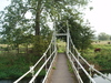 The suspension bridge over the Avon at Burgate Manor Farm.