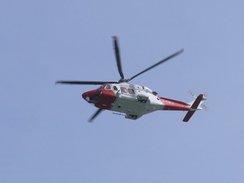 P20084264392	A Coastguard helicopter above Weymouth.