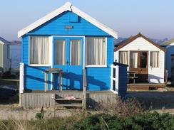 P2010B290829	Beach huts on the spit to the north of Hengistbury Head.