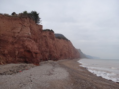 P2011DSC07064	The red cliffs stretching away east from Sidmouth.