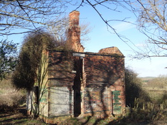 P2018DSC07516	A  derelict former railway signalman's cottage near Stevington.