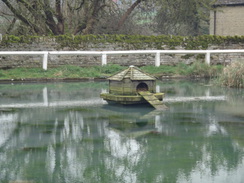 P2018DSC09660	A duckhouse in Barrowden pond.