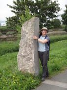 P2018DSC01355	Sencan hugging the stone marking the border with Wales.