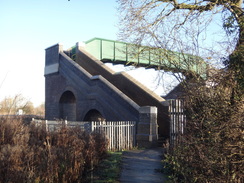 P2018DSC06541	A footbridge over the railway near Isham.