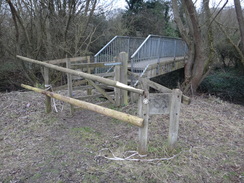 P2019DSC07419	A footbridge over the Ingrebourne River, and an impassable gate.
