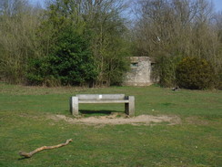 P2019DSCF2723	A bench and pillbox in the grounds of Bentley Priory