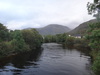 The River Nevis in Fort William, with the flank of Ben Nevis behind.