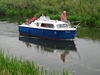 A cruiser on the River Nene (Old Course).