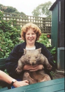 AE29	Sam holding a wombat at the wildlife reserve 