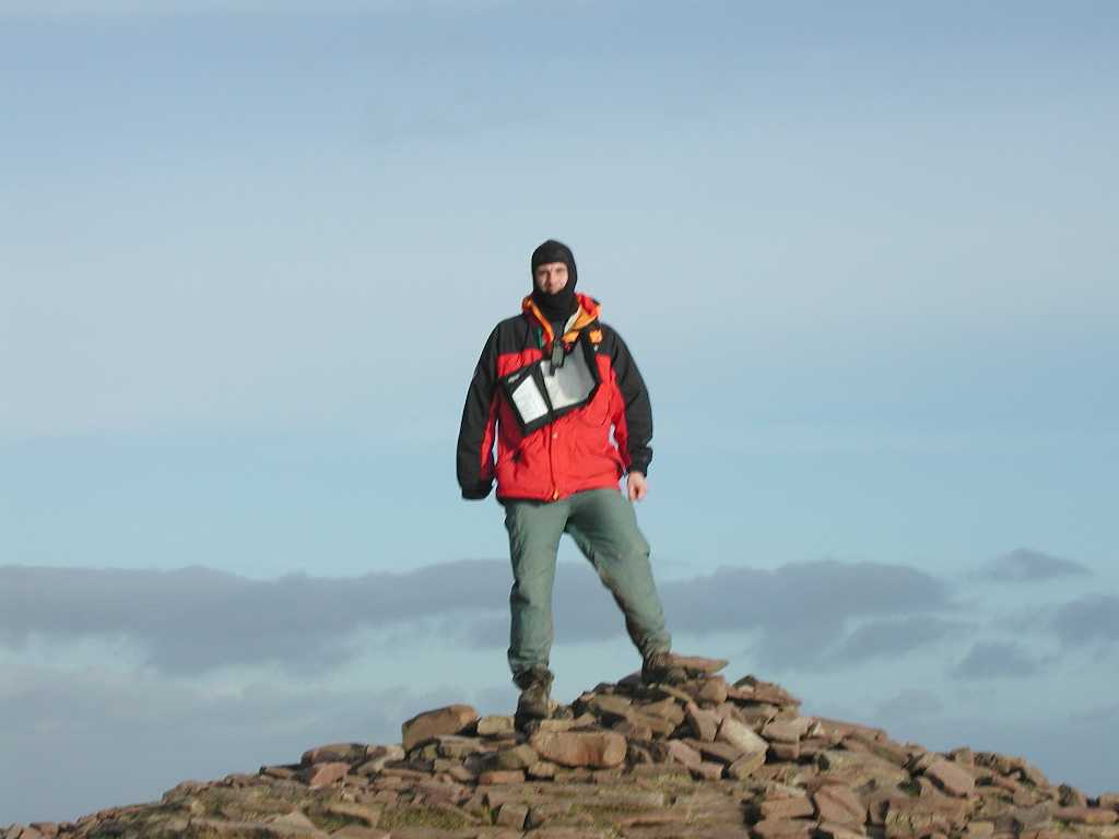Myself standing on the cairn at the top of Pen y Fan.