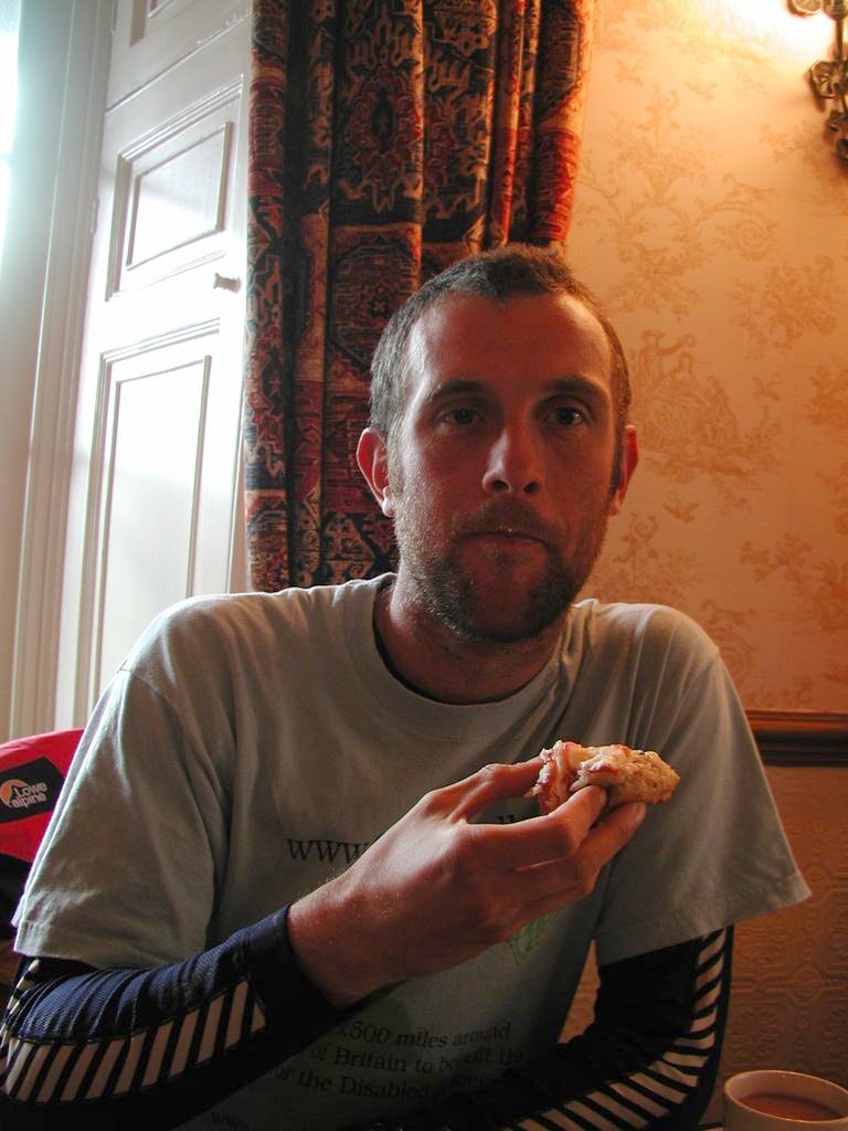 Myself eating an early-morning Devonshire cream tea 