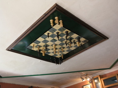 P20079169247	A chessboard on the ceiling of the Motte and Bailey pub, Pirton.