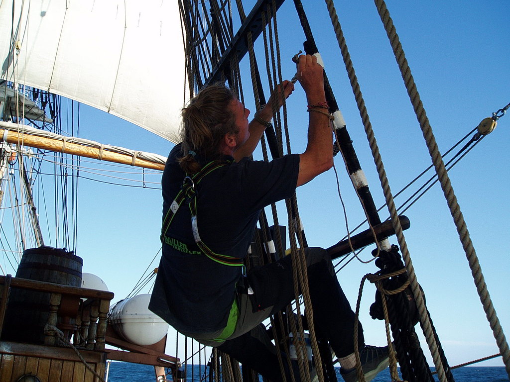 Neil painting some of the rigging.