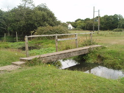 P20108030052	A footbridge over a stream on Winkton Common.