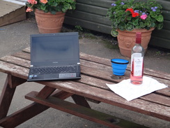 P2011DSC02959	Luxury camping - a laptop and wine.