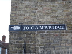 P2012DSC08597	A road sign on a building in Godmanchester.