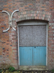 P2018DSC09124	An anchor plate and doorway at Ashton Mill.