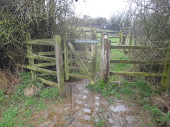 P2018DSC09583	A flooded stile on the path between Rockingham and Gretton.