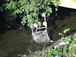 P2018DSC09866	The obligatory shopping trolley in a stream beside the path.