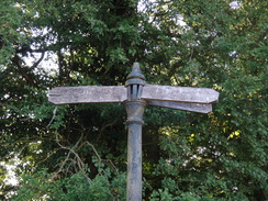 P2018DSC02374	An illegible signpost near Charwelton Lodge.